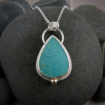 Tropical blue opalized fossil wood necklace in sterling silver and 14K gold by Mikel Grant Jewellery