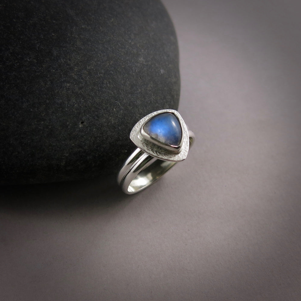 Triangular rainbow moonstone halo ring in sterling silver by Mikel Grant Jewellery