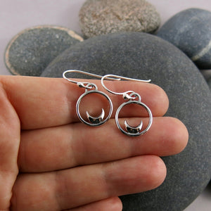 Mini silver crescent moon dream earrings by Mikel Grant Jewellery.