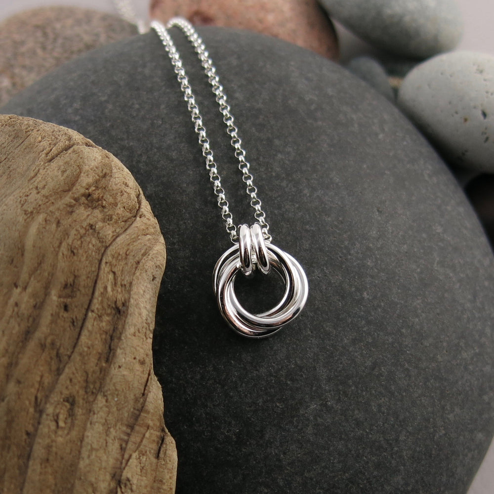 Silver love knot trio necklace by Mikel Grant Jewellery. Mini timeless love knot necklace.