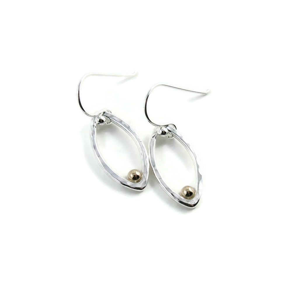 Modern minimalist sterling silver leaf earrings with gold dewdrops by Mikel Grant Jewellery.