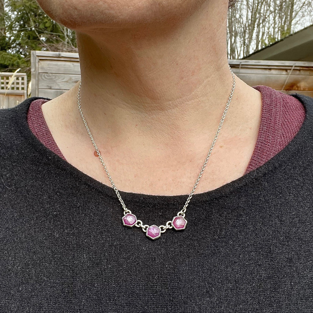 Pink star sapphire hexagon trio necklace in sterling silver by Mikel Grant Jewellery. Viva Magenta Jewellery Collection.