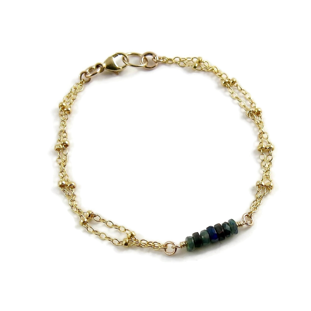 Gold double strand satellite chain bracelet with black opal beads by Mikel Grant Jewellery