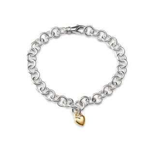 Sweethearts charm bracelet by Mikel Grant Jewellery.  14K Gold puffy heart charm on an adjustable sterling silver chain link bracelet.