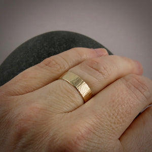 14K Gold Wedding Band by Mikel Grant Jewellery. Medium width bark textured gold band.