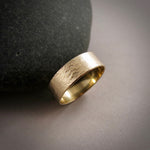 14K Gold Wedding Band by Mikel Grant Jewellery.  Abstract textured medium width gold band.
