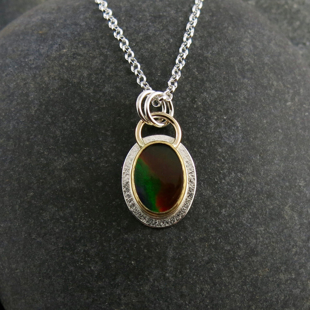 Stunning ammolite necklace in sterling silver, 22K and 14K gold by Mikel Grant Jewellery