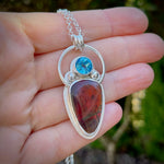 Red ammolite and blue topaz statement necklace in sterling silver by Mikel Grant Jewellery