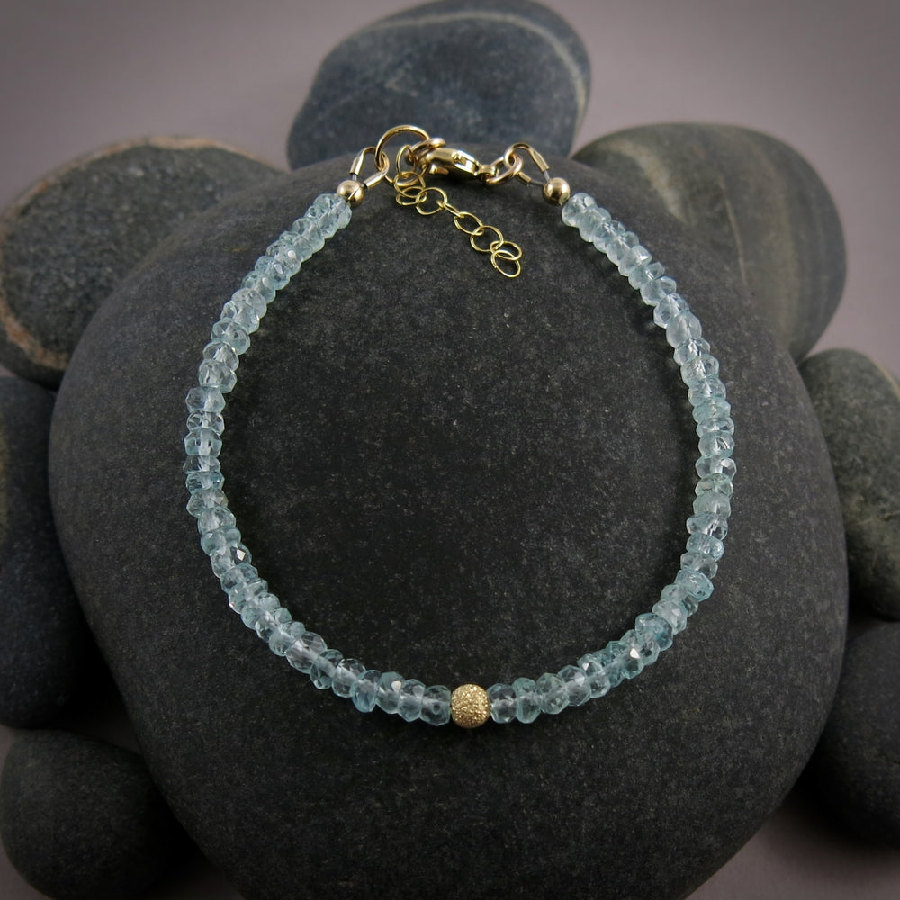 Faceted aquamarine gemstone bead bracelet in 14K gold fill by Mikel Grant Jewellery