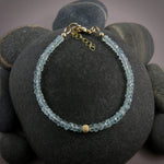 Faceted aquamarine gemstone bead bracelet in 14K gold fill by Mikel Grant Jewellery