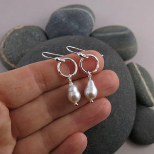Light silver baroque pearl circle drop earrings by Mikel Grant Jewellery.