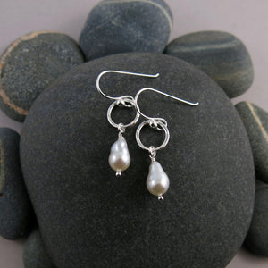 Light silver baroque pearl circle drop earrings by Mikel Grant Jewellery.