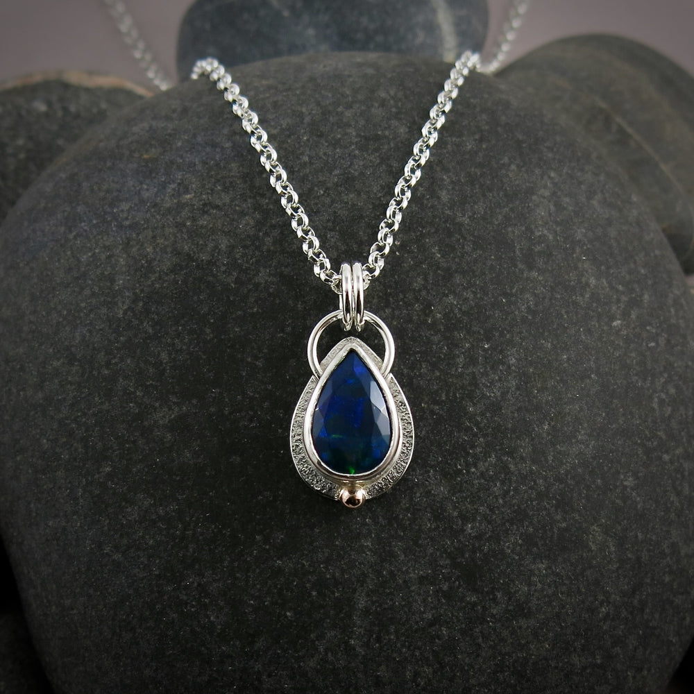 Black Welo opal teardrop necklace in sterling silver & 14K gold by Mikel Grant Jewellery
