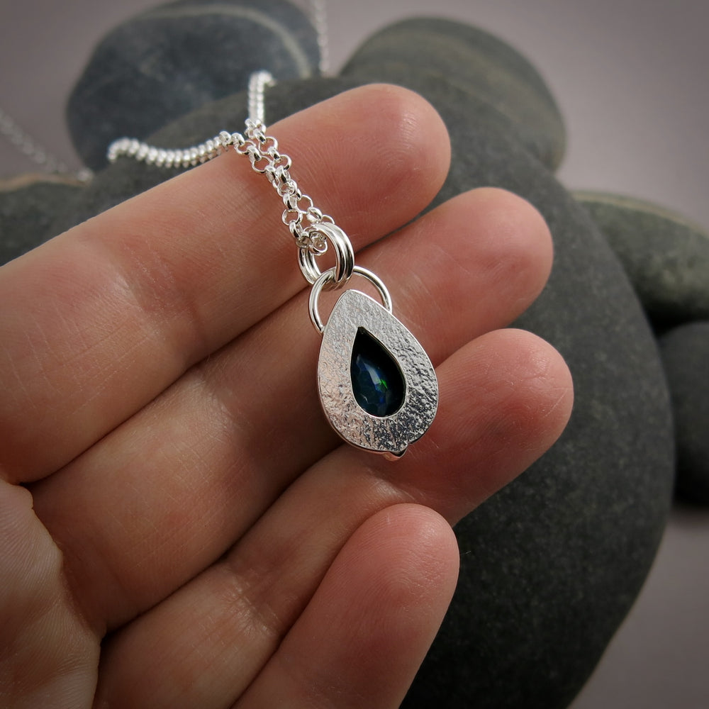 Black Welo opal teardrop necklace in sterling silver & 14K gold by Mikel Grant Jewellery