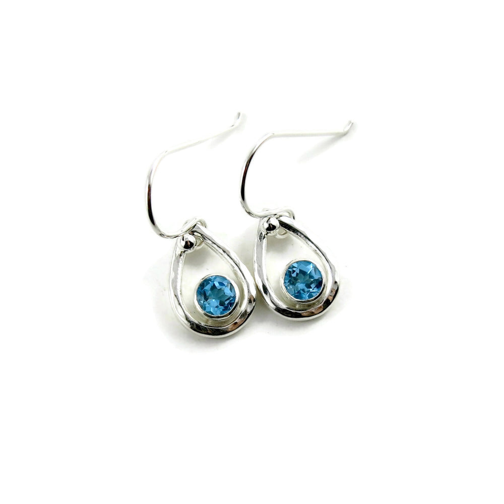 Swiss blue topaz raindrop earrings in hammered sterling silver by Mikel Grant Jewellery
