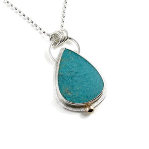 Tropical blue opalized fossil wood necklace in sterling silver and 14K gold by Mikel Grant Jewellery