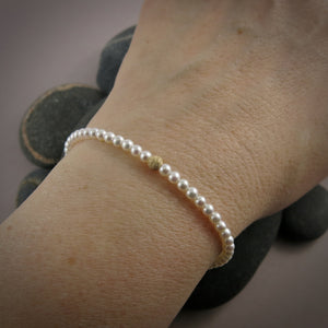 Dainty white akoya pearl bracelet with 14K gold filled accents by Mikel Grant Jewellery