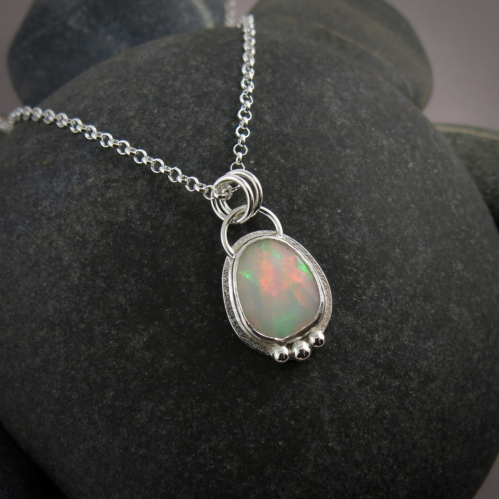 Faceted Welo opal necklace in sterling silver by Mikel Grant Jewellery