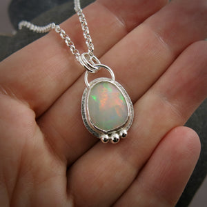 Faceted Welo opal necklace in sterling silver by Mikel Grant Jewellery