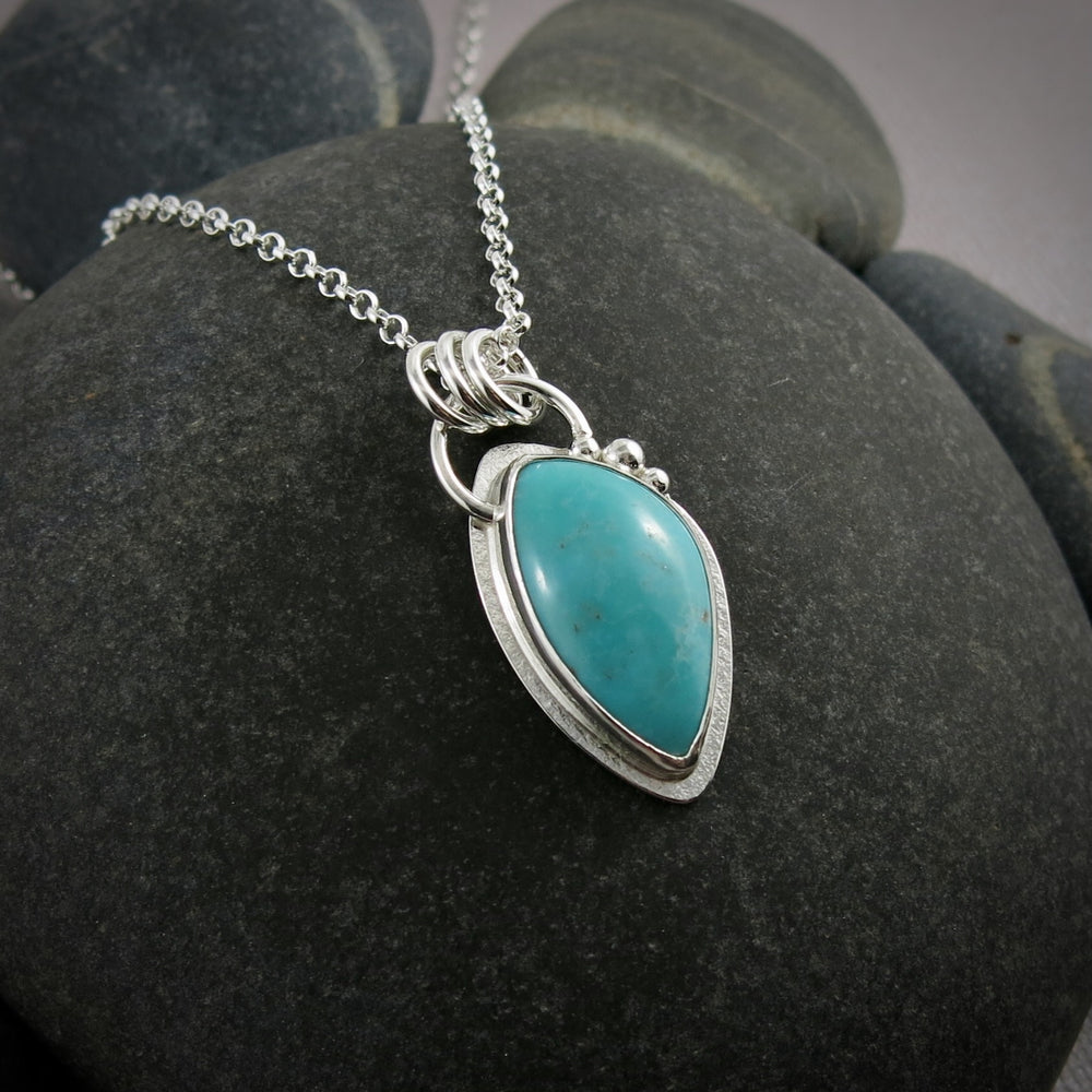 Freeform Arizona turquoise pendant in sterling silver by Mikel Grant Jewellery