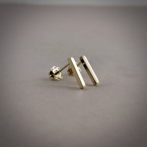 Solid gold bar studs.  Minimalist gold bar stud earrings by Mikel Grant Jewellery