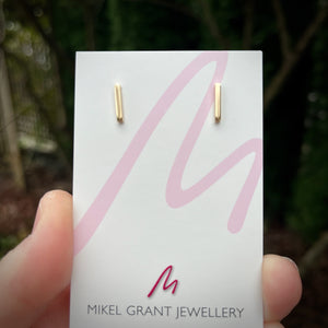 Solid gold bar studs.  Minimalist gold bar stud earrings by Mikel Grant Jewellery