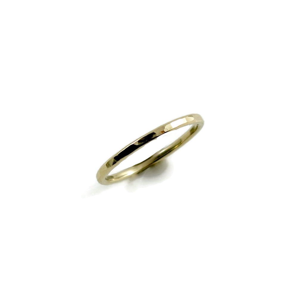 Gold Eternity Ring by Mikel Grant Jewellery.  Hammer textured 14K gold band.