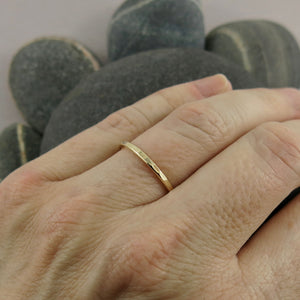 Gold Eternity Ring by Mikel Grant Jewellery. Hammer textured 14K gold band.