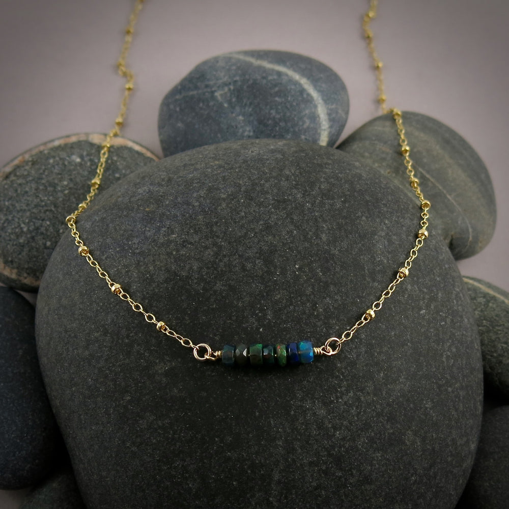 Gold satellite chain necklace with black opal beads by Mikel Grant Jewellery