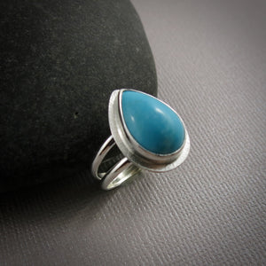 Kingman turquoise teardrop split-shank ring in sterling silver by Mikel Grant Jewellery.  Size 8.