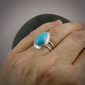 Kingman turquoise teardrop split-shank ring in sterling silver by Mikel Grant Jewellery.  Size 8.