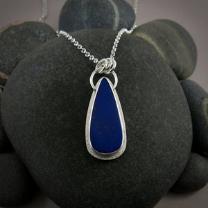 Lapis lazuli teardrop halo necklace in sterling silver by Mikel Grant Jewellery.
