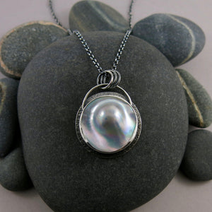 Large mabe pearl necklace in oxidized sterling silver by Mikel Grant Jewellery.