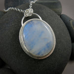 Large oval rainbow moonstone necklace in sterling silver by Mikel Grant Jewellery