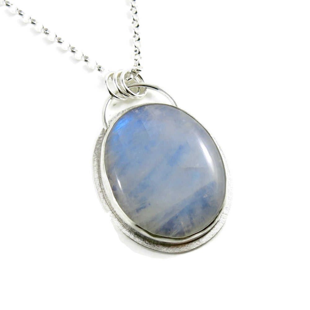 Large oval rainbow moonstone necklace in sterling silver by Mikel Grant Jewellery