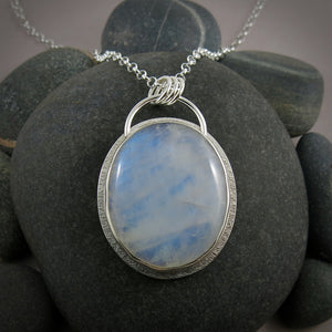 Large oval rainbow moonstone necklace in sterling silver by Mikel Grant Jewellery