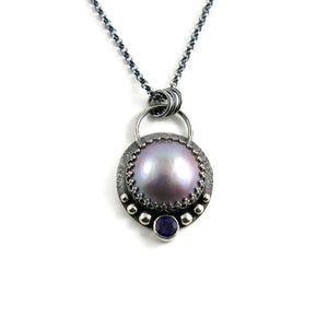 Lilac mabe pearl necklace with amethyst in oxidized sterling silver by Mikel Grant Jewellery.