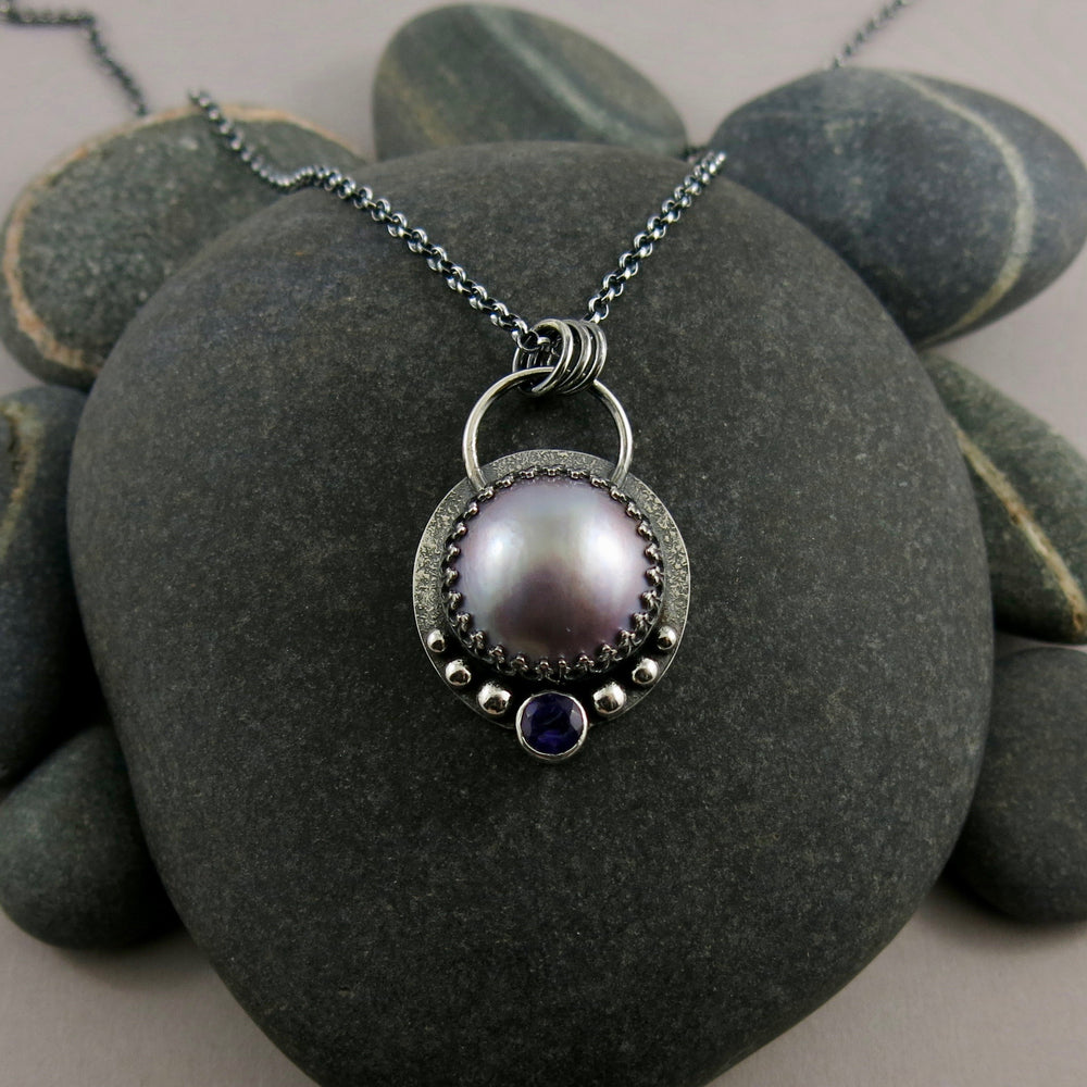 Lilac mabe pearl necklace with amethyst in oxidized sterling silver by Mikel Grant Jewellery.