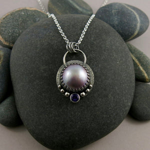 Lilac mabe pearl necklace with amethyst in oxidized sterling silver by Mikel Grant Jewellery.