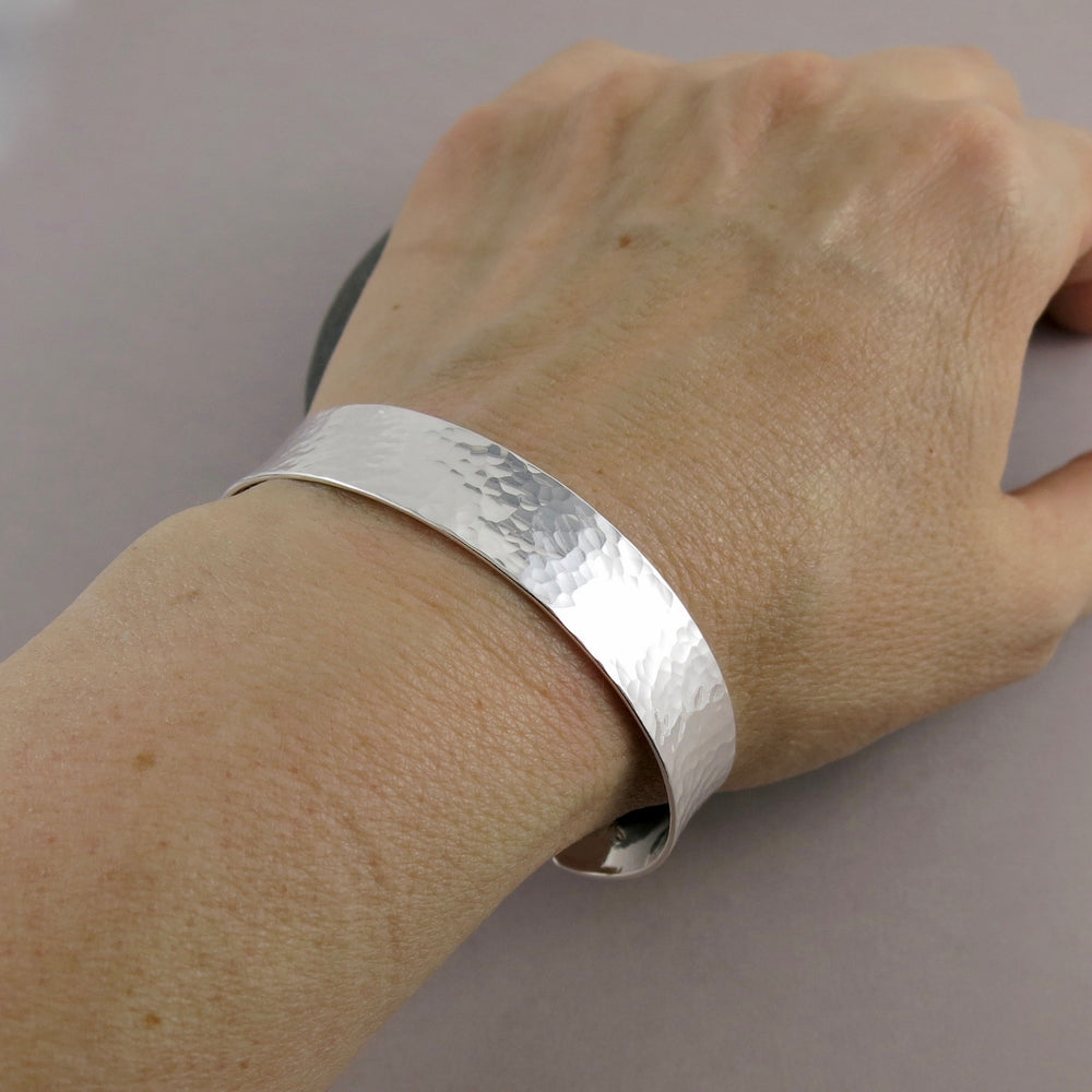 Convex hammer textured sterling silver cuff bracelet in medium width by Mikel Grant Jewellery