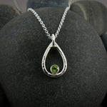 Sterling silver raindrop necklace with a faceted peridot by Mikel Grant Jewellery.