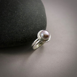 Petite pink button pearl halo ring in sterling silver by Mikel Grant Jewellery