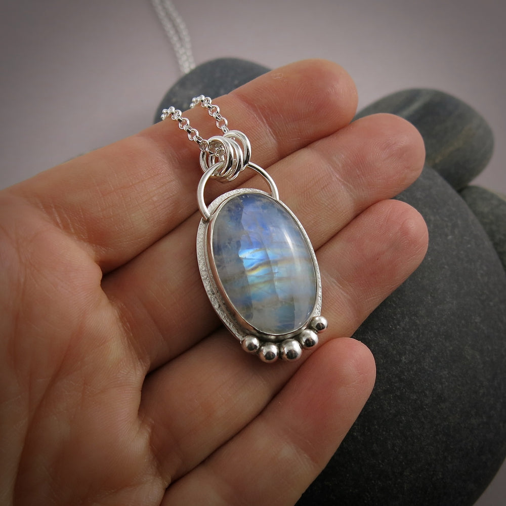 Rainbow moonstone halo necklace in sterling silver by Mikel Grant Jewellery