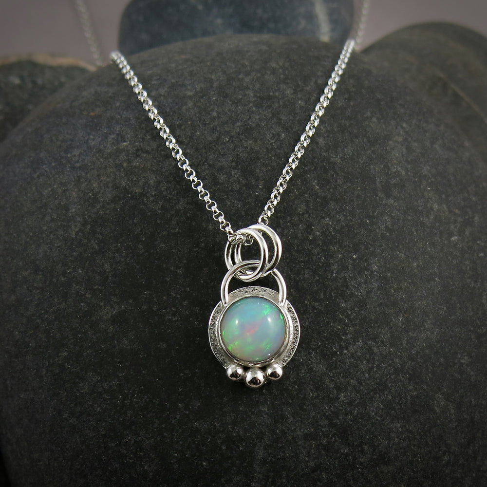 Round Welo opal necklace in sterling silver by Mikel Grant Jewellery