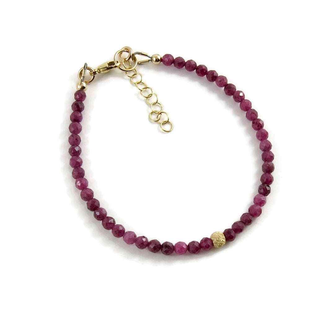 Dainty ruby gemstone bead bracelet with 14K gold filled accents by Mikel Grant Jewellery.