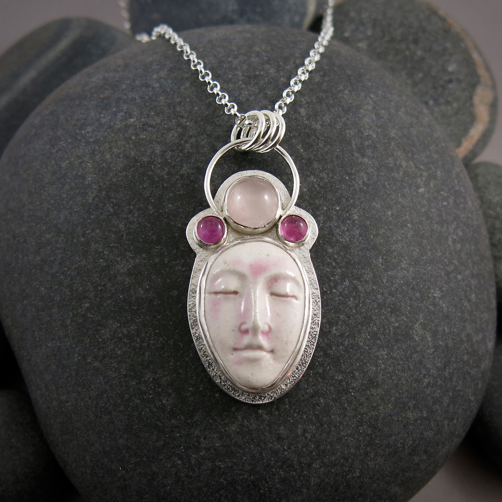 Serenity Necklace by Mikel Grant Jewellery.  Handcrafted sterling silver necklace with ceramic face, rose quartz and pink tourmaline.