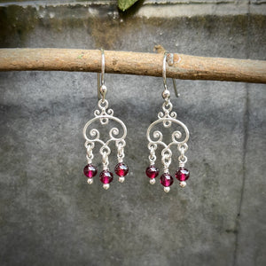 Silver scroll earrings with garnet bead drops by Mikel Grant Jewellery