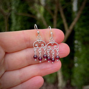 Silver scroll earrings with garnet bead drops by Mikel Grant Jewellery