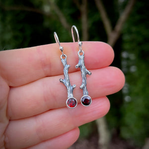 Silver twig earrings with faceted garnets by Mikel Grant Jewellery