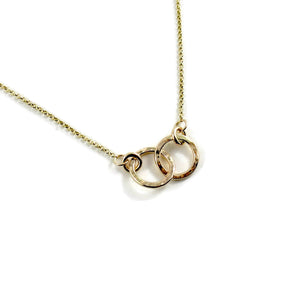 Solid 14K gold embrace necklace by Mikel Grant Jewellery